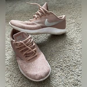 Nike tennis shoes beautiful color.  Great condition.